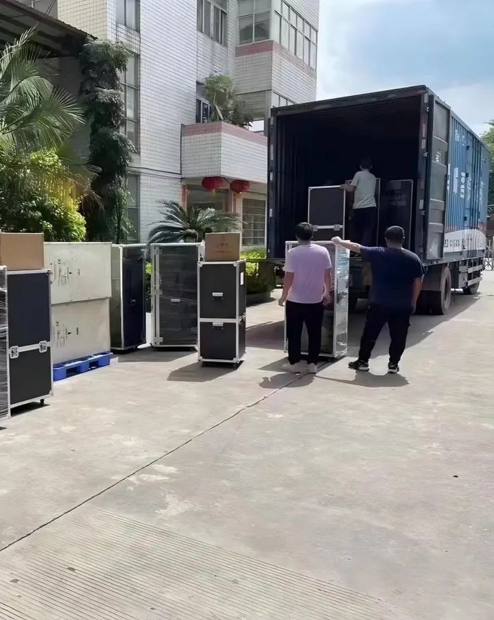FQBeauty flight cases and beauty machines being loaded into a truck for export delivery