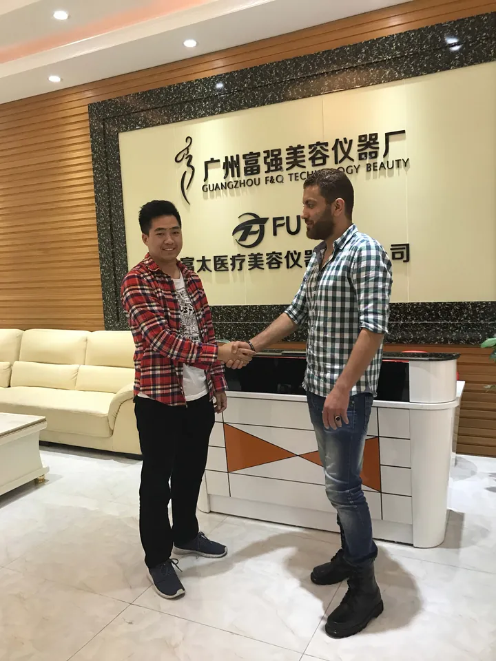 FQBeauty representative discussing beauty machine options with an overseas buyer