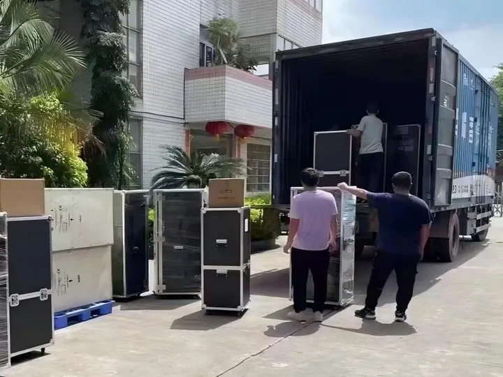 Protective beauty machine cases being loaded for dispatch from the factory